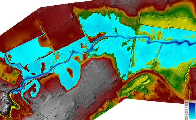 Resultado de una modelación hidrodinámica sobre el terreno, con la mancha de inundación coloreada según la profundidad del agua